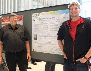 Darwin Daugaard (left) a high school science teacher from South Dakota and participant in this summer's RET program in CBE, is shown with his son Tannon, an ISU graduate student.