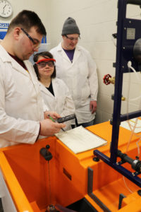 Students with new lab equipment