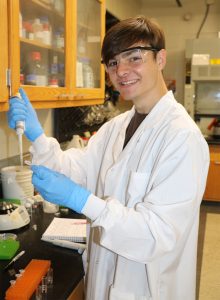 BioMAP REU student Michael O'Sullivan in lab 2022