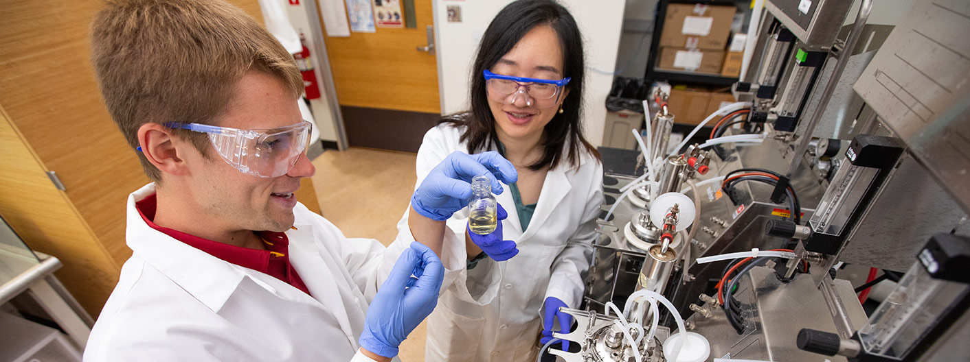 professor and student in lab setting