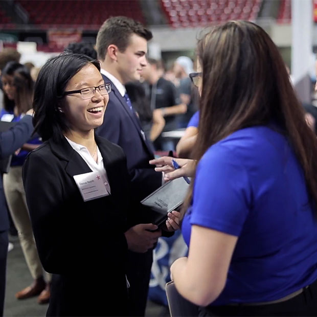 student and employer interaction at career fair